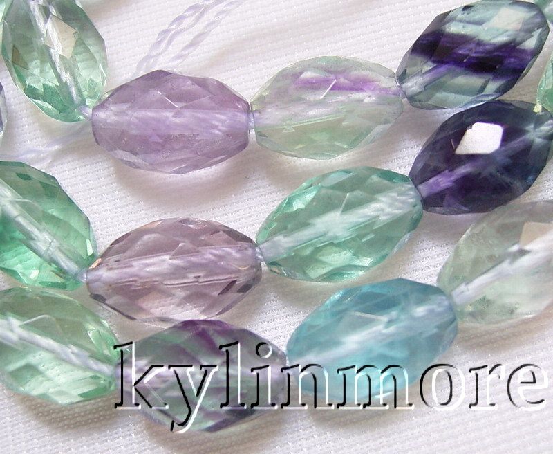   purple fluorite length 15 size 8x12mm shape faceted rice color as